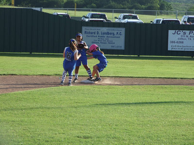 Image: Double team — Katera Birdow and Sarah Sanders take on the Lindale player just at the right time.