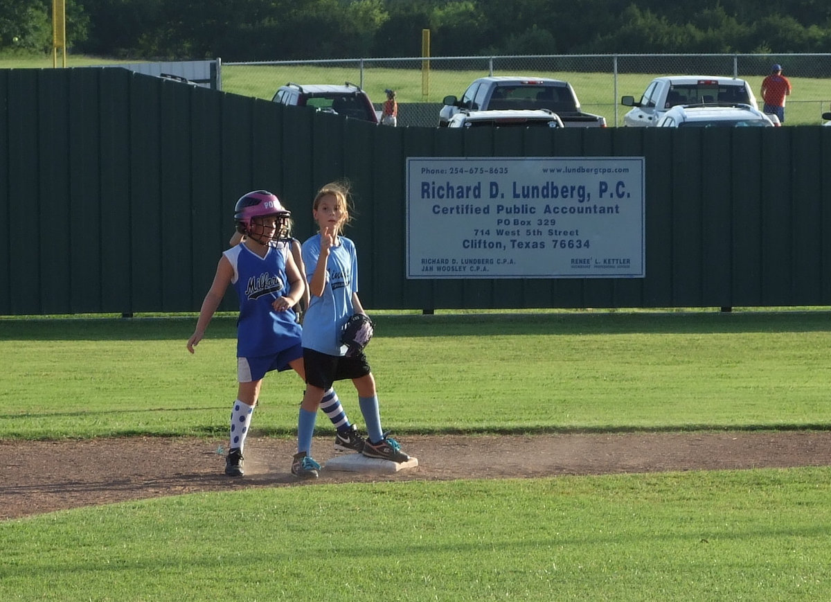 Image: I’m running home — Milford’s Callie Poore is just waiting for the chance to score.