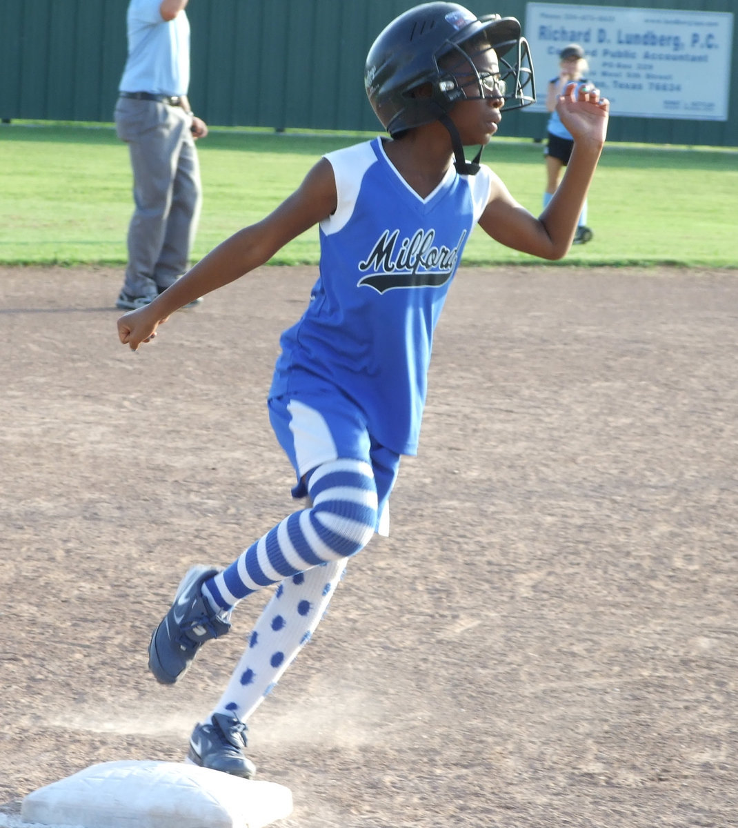 Image: She’s coming home — Jace McIntyre had no problems rounding third.