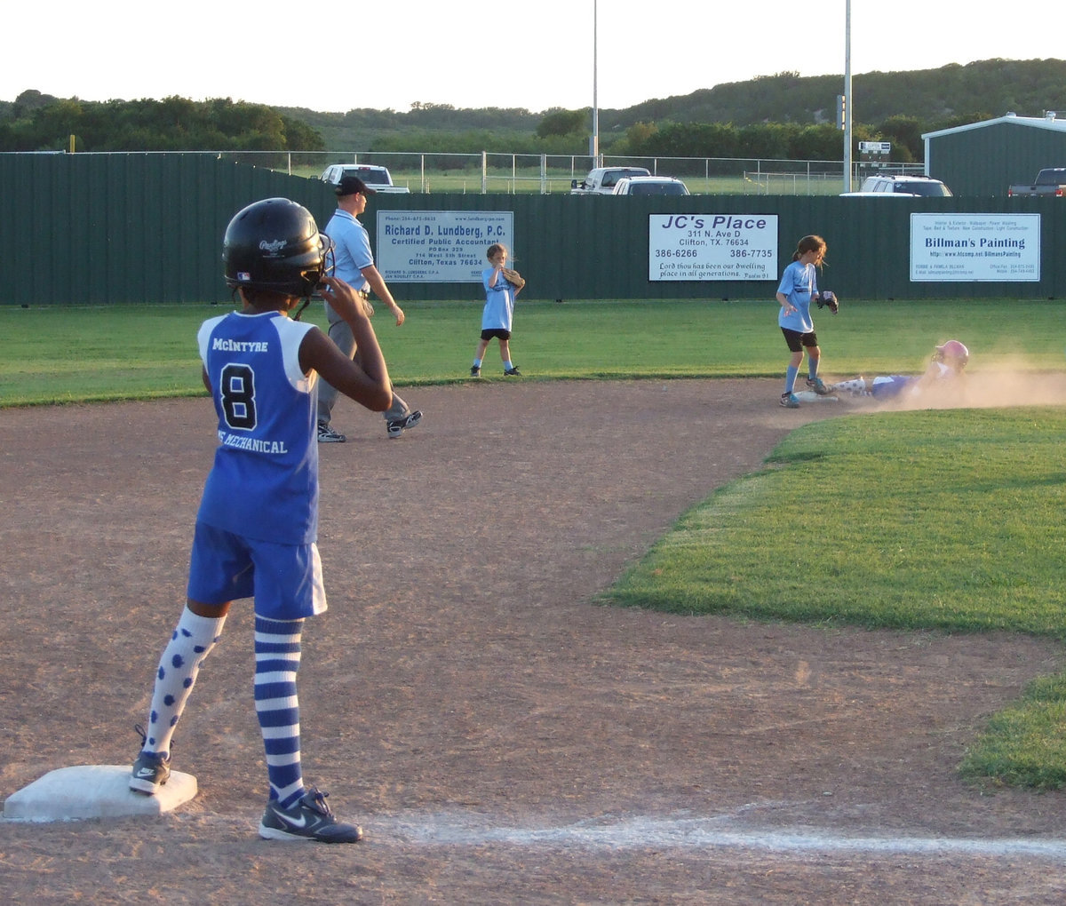 Image: Bringing home a little dirt — Sarah has learned to use her sliding technique.