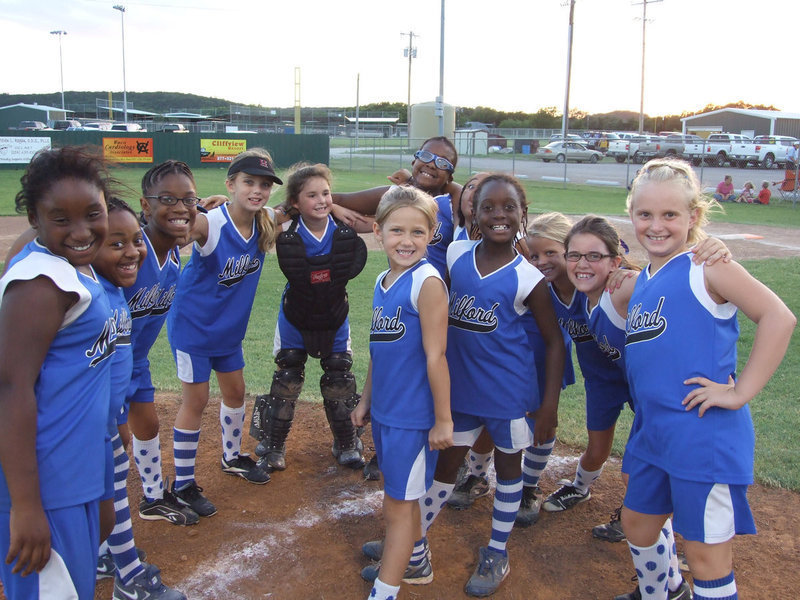 Image: We won, you bet — Milford Lil’ Dogs has one more win under their belt. (L-R) Jenaria Brooks, Alandra Montgomery, Jace McIntyre, Gracie Whittington, Bree Brown, Kieauna Hurtt, Katera Birdow, Alex Jones, Sarah Sanders and Callie Poore.  In the middle are Abbey Evans and Markia Houston.