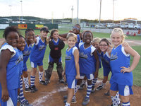 Image: We won, you bet — Milford Lil’ Dogs has one more win under their belt. (L-R) Jenaria Brooks, Alandra Montgomery, Jace McIntyre, Gracie Whittington, Bree Brown, Kieauna Hurtt, Katera Birdow, Alex Jones, Sarah Sanders and Callie Poore.  In the middle are Abbey Evans and Markia Houston.