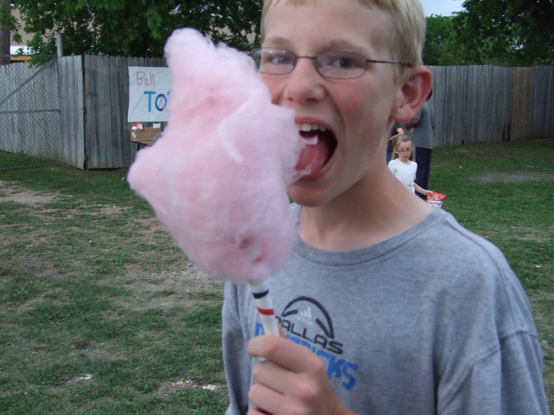 Image: This is awesome — Cody Boyd eats cotton candy at Stafford Night At the Ballpark on Friday night.