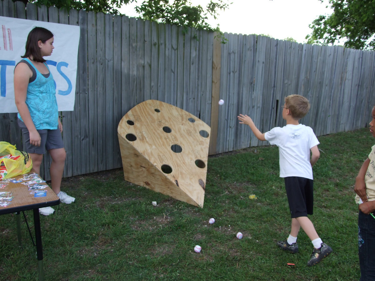 Image: Ball toss — Kort Holley gives the ball toss a chance.