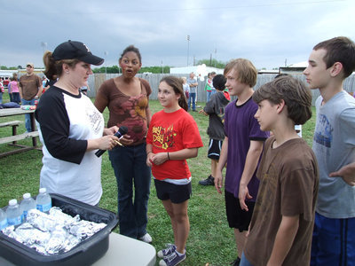 Image: What did you say? — Clover Stiles explains the rules for the hot dog eating contest to Oleshia Anderson, Sarah Connor, Levi McBride, Lance Peck and Ryan Connor.