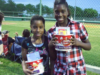 Image: Winners — Raven Harper and Janae Robertson won a bucket of candy and a movie.