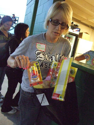 Image: Teacher stuff — Mrs. Jacinto was very pleased to have won a bag of goodies.