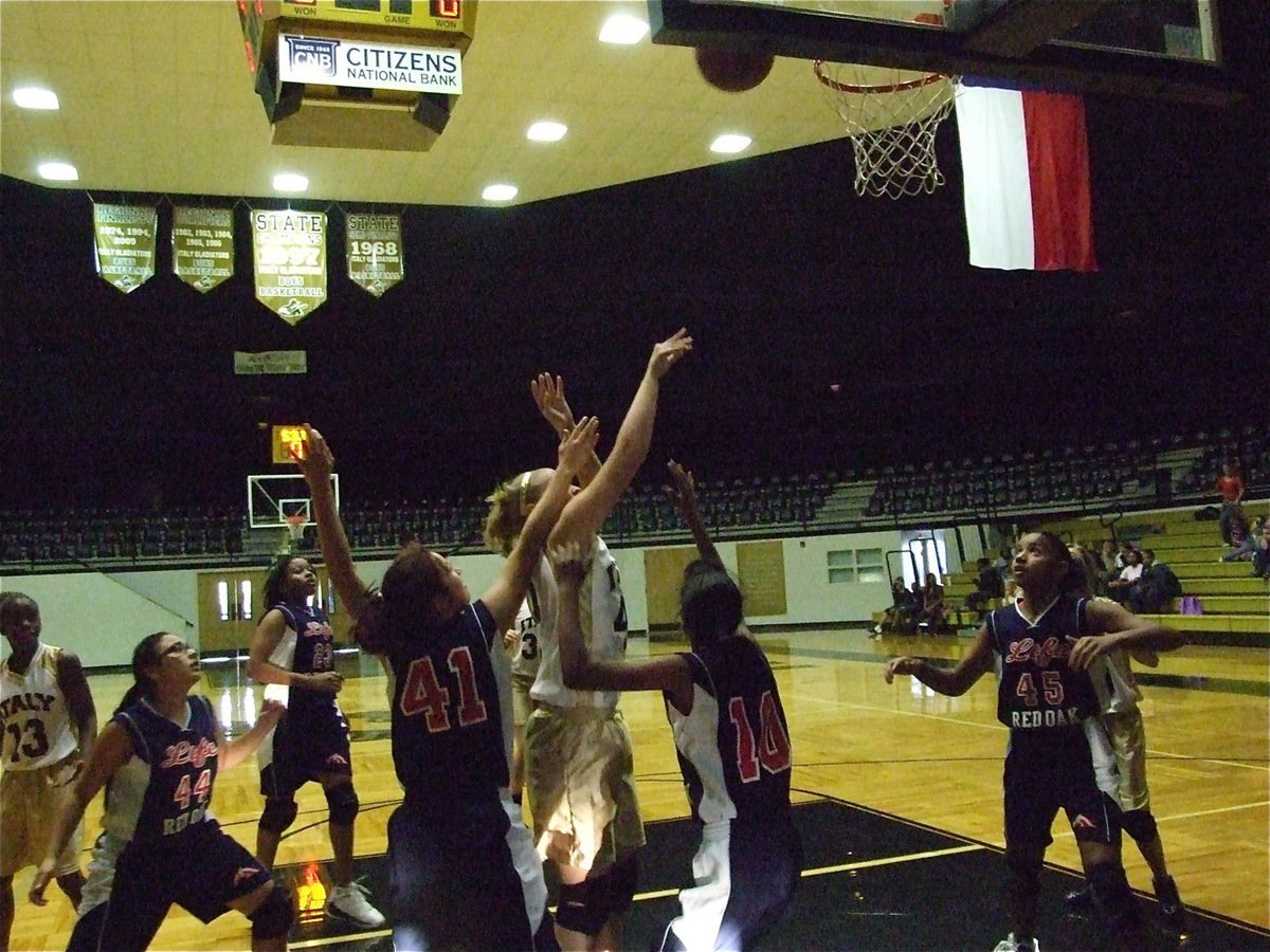 Image: Lewis banks it — Jaclynn Lewis(41) puts up a shot against Red Oak Life.