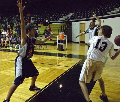 Image: Chace flings it — Chace McGinnis(13) inbounds the ball higher than an Eagle.