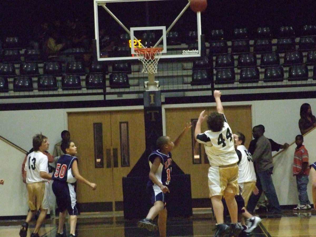 Image: John from the elbow — John Byers goes up for a shot against the Eagles.