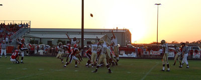 Image: Up and away — The Gladiators try to block a field goal kick by Maypearl’s Cody Aydelott.