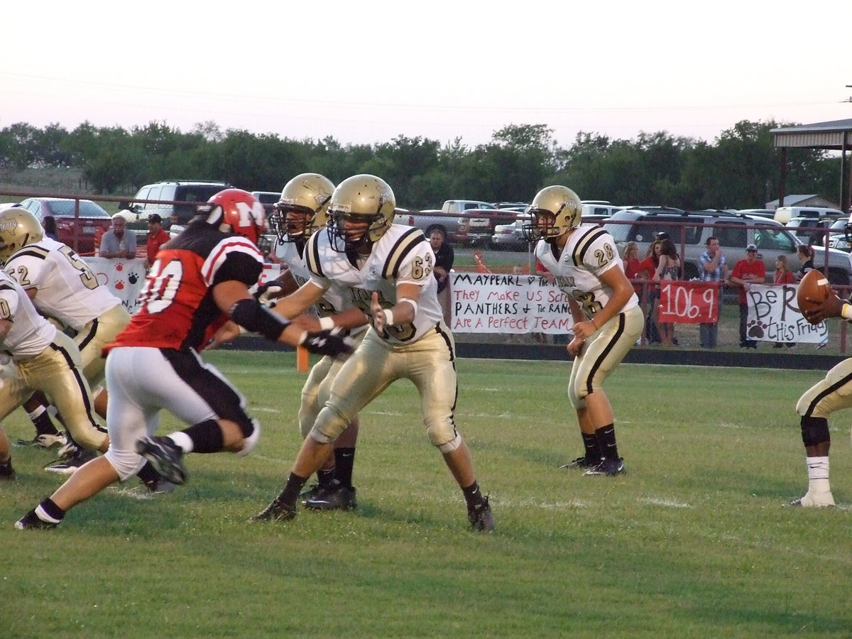 Image: Pocket protection — Italy’s Brandon Souder(63), Omar Estrada(56), Ethan Simon(50), Jacob Lopez(52) and Kyle Jackson(28) create a pocket for their quarterback, Jasenio Anderson.