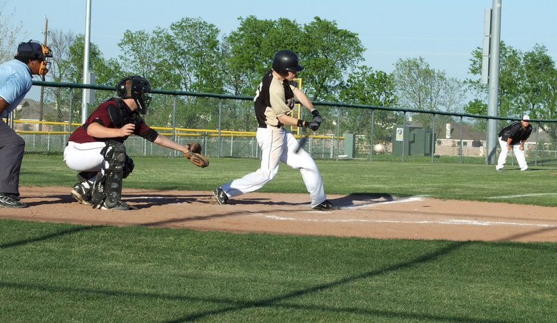 Image: “Deadeye” Dan — Dan Crownover takes careful aim at this pitch.