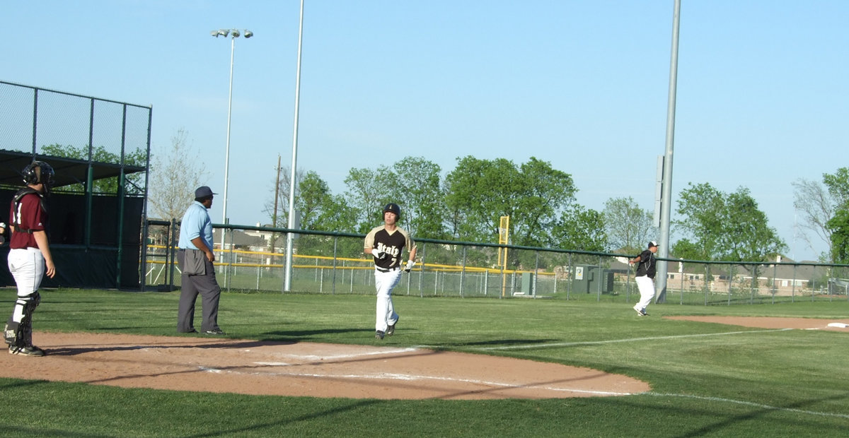 Image: Trevor runs in — Coach Coker calls for Trevor Patterson to run.