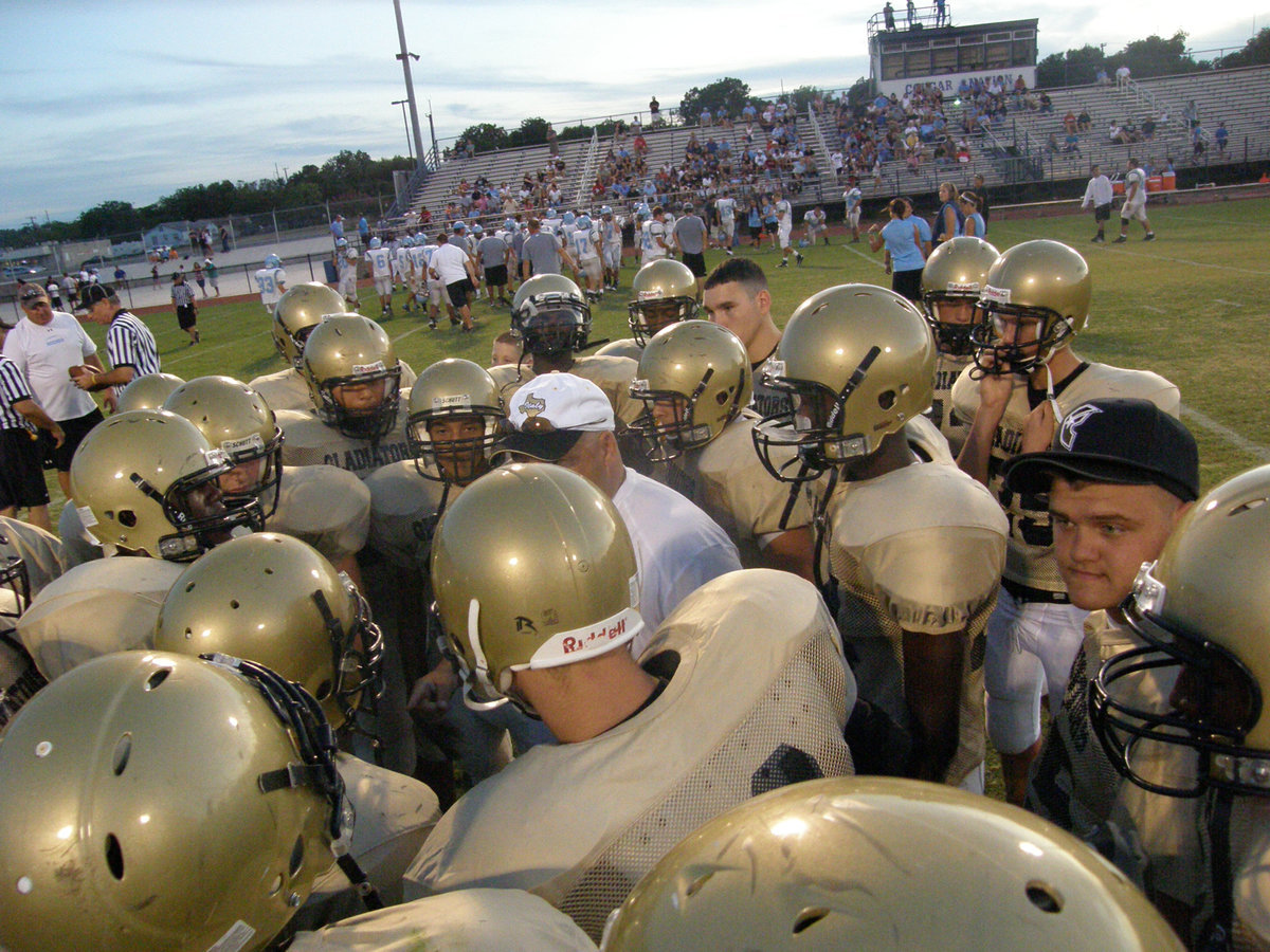 Image: Coach Bales motivates — Gladiators set to go live against the 2-time defending champs in TAPPS Division III football.