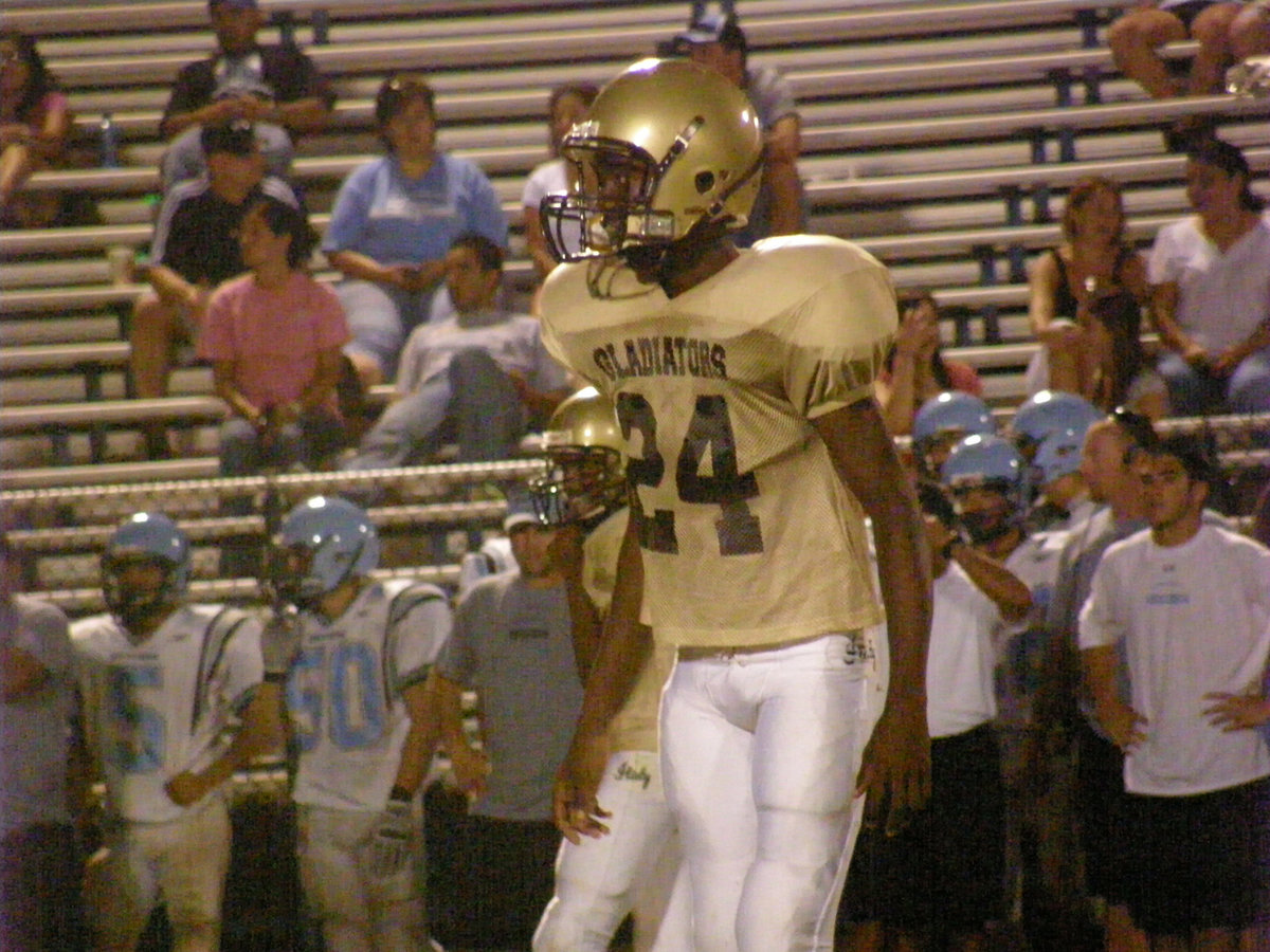 Image: Thomas on defense — Aaron helps out in the Gladiator secondary.