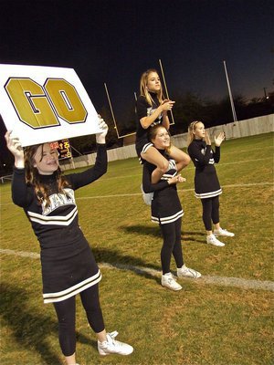 Image: G-O! — Meagan, Taylor, Kelsey and Lauren (top) shout, “Go!”