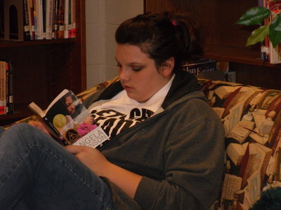 Image: Senior Cori Jeffords — Cori is taking part in the Read It Forward: Pass It On literacy project by reading the book First Part Last by Angela Johnson.