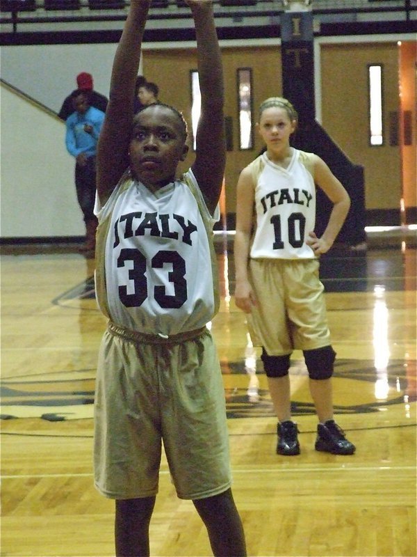 Image: K’Breona makes it — K’Breona Davis(33) hits 1-of-2 free shots while Bailey Eubank(10) gets ready to play defense.