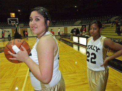 Image: Two tough — Monserrat Figueroa and Bernice Hailey(22) get warmed up before the game against Red Oak Life.