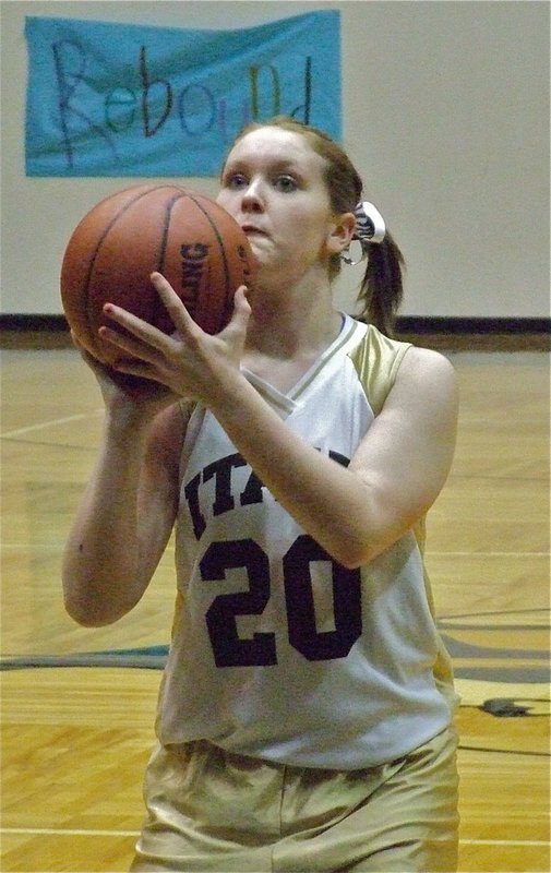 Image: Wilkins wills it in — Jesica Wilkins(20) practices a free throw.