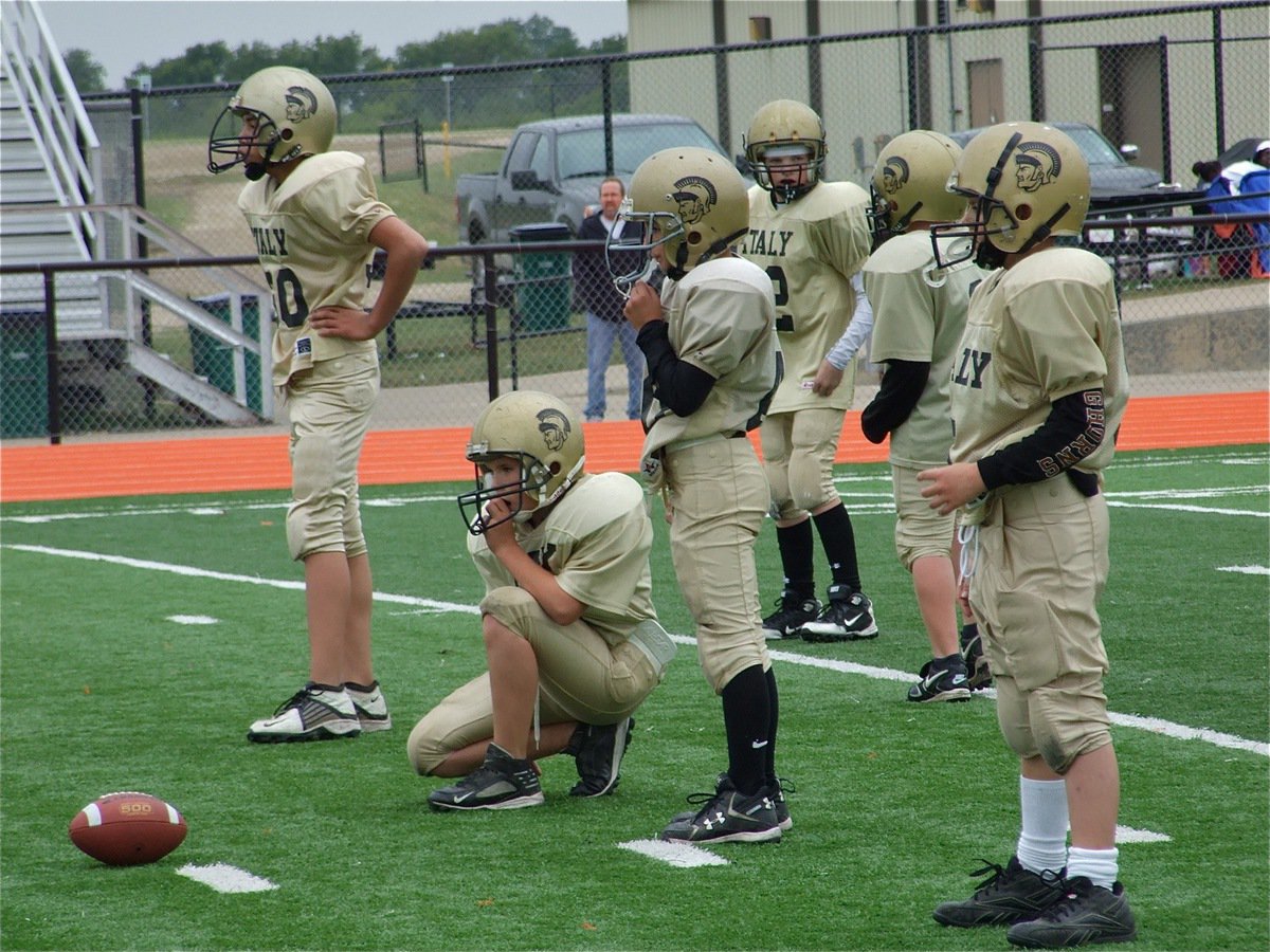 Image: D-fining moment — Issac Salcido and his defensive teammates shut down the Ferris offense to help the A-Team win their first game of the 2009 season, 20-6.