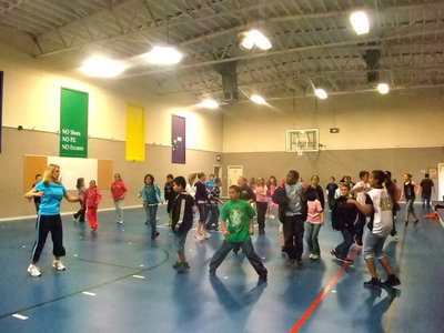 Image: More Dance Moves — The students are trying to learn the dances.