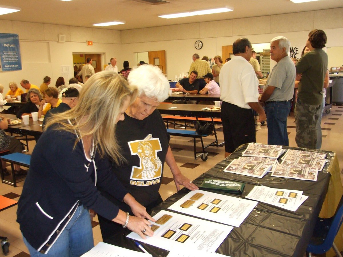 Image: Becky and Mrs. Saxon — Becky Milligan explains how the fundraiser will work.