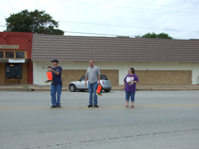 Image: Fill the Boot volunteers  — Tommy Sutherland, Brad Chambers — both Italy firefighters, and Karen Mathiowetz — one of the Italy Relay for Life team leaders.