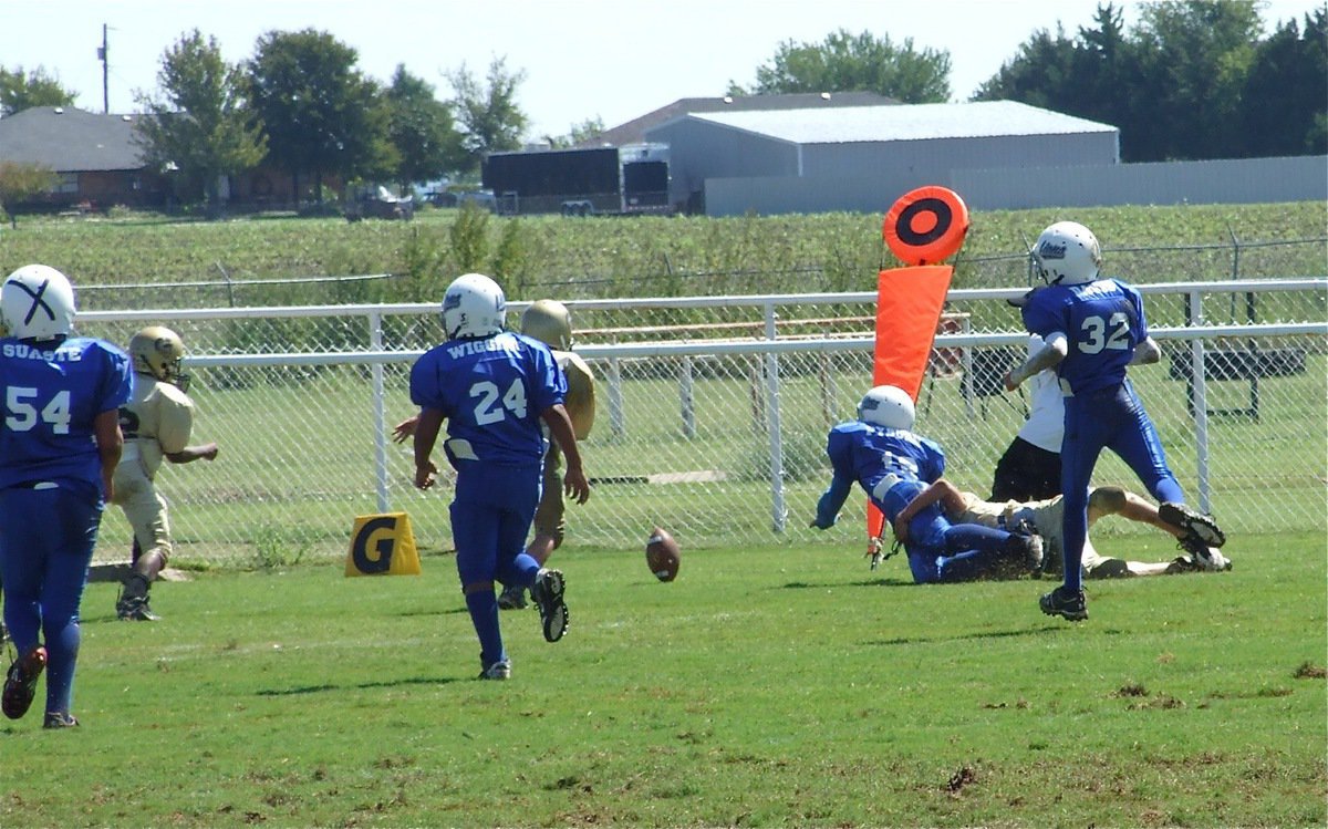 Image: Fumble! — A hustling tackle by Joseph Celis forced the Lions to fumble into the B-team endzone for a Gladiator touchback. Italy took over at their own 20-yard line.