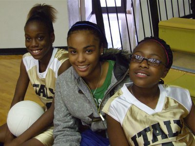 Image: Smiling and profiling — Kortnei, Tylar and K’Breona relax before game time.