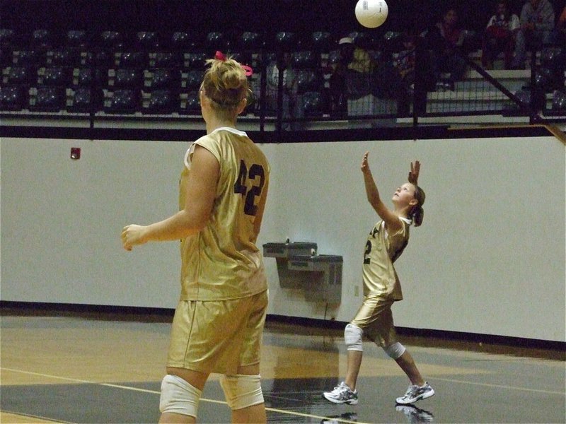 Image: Bailey serves — Bailey prepares to serve another ace. The Italy’s 7th grade’s monstrous serves were the difference in this one.