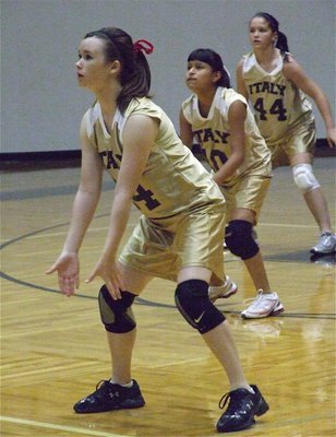 Image: Threetermined — Meagan Hooker, Jessica Garcia and Paige Westbrook had each others back. The 8th grade team finished the 2009 season with a respectable 3-4 record.
