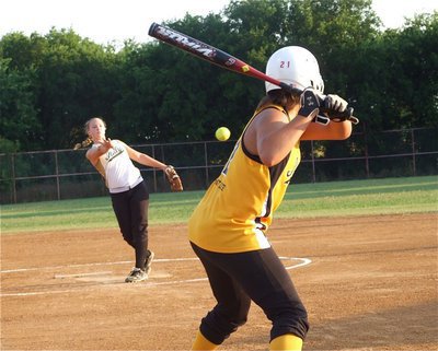 Image: Take that! — Pitcher Jaclynn Lewis fires a strike across the plate.