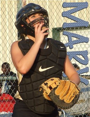 Image: Eyes on the ball — Catcher Mary Tate displayed toughness for Italy’s 15 &amp; Under Lady Gladiators softball team surviving two collisions at the plate against Itasca.