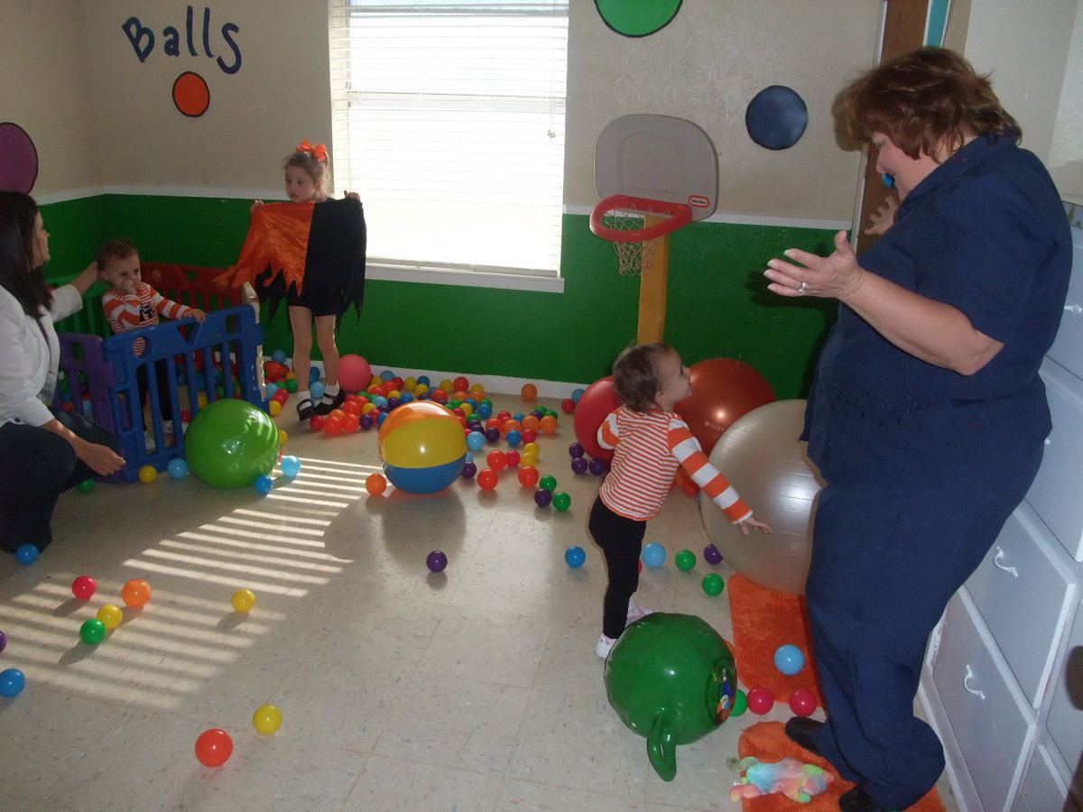 Image: The “Ball Room” — Maegen Fullen, her children Addison, Emerson and Alexia, were already having fun in the “ball room” as Patrica Burk (owner) watches their fun.