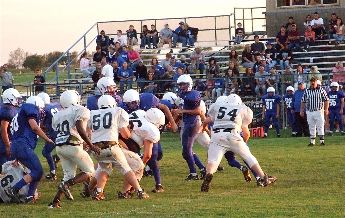 Image: Italy penetrates — Italy’s defense has the Frost quarterback on the run.