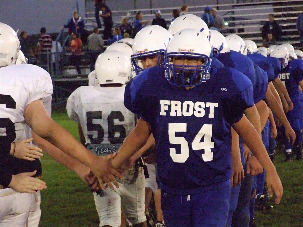 Image: Sportsmanship — Italy and Frost shake hands after the game knowing they will meet again.