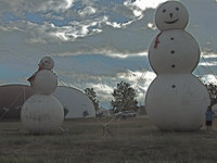 Image: Monolithic snowmen — You will see these friendly snowmen bobbing hello to all those who pass by on Highway 35, in Italy, Texas.
