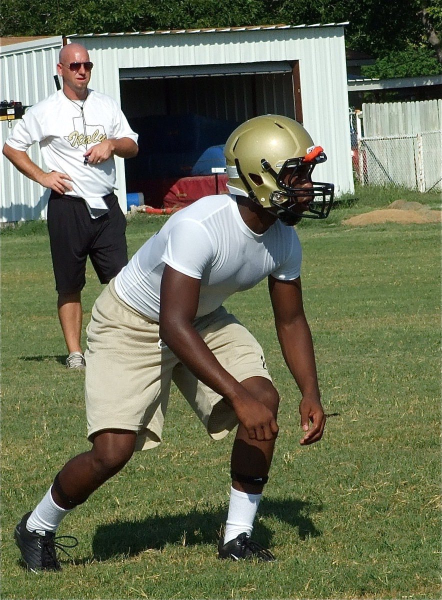 Image: “Beast” is hungry — Defensive Coordinator Jeff Richters watches his linebacker Jasenio “Beast” Anderson in action.