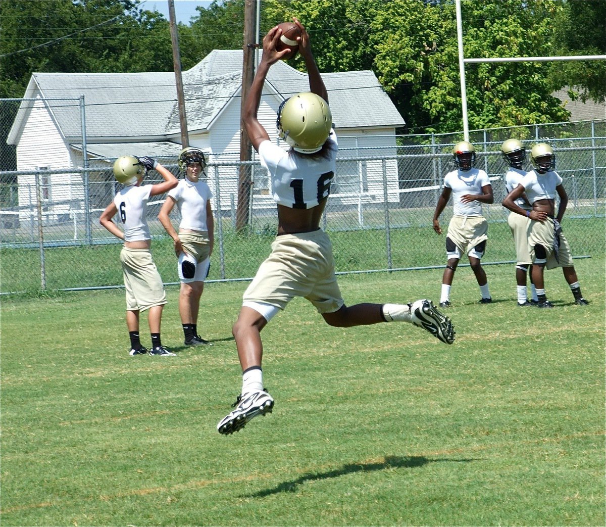 Image: Tre uses two hands — Trevon Robertson shows his athleticism by making this two-handed grab.