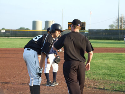 Image: Cole and Coach — Cole Hopkins gets some advice from Coach Ward.