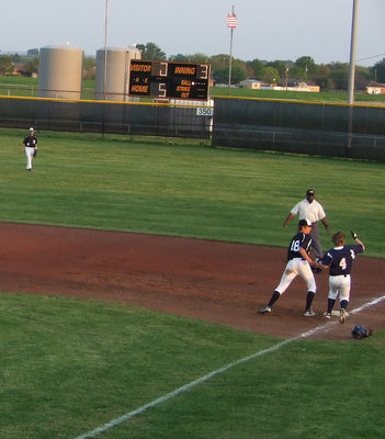 Image: Is he out? — First baseman, Cole Hopkins, goes in for the kill.