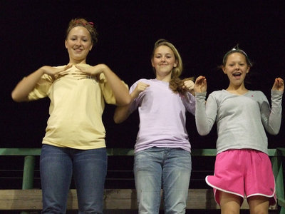 Image: The Chicken Dance — If you haven’t come to a Gladiator baseball game yet, you are missing out.  These young ladies are having fun doing the Chicken Dance. (L-R) Jaclynn Lewis, Kelsey Nelson and Bailey Eubanks.