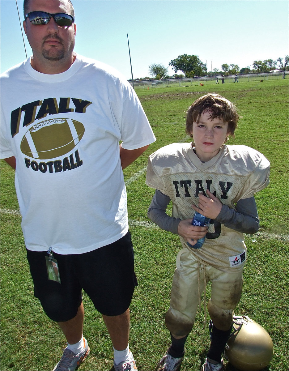 Image: Aaron and Ryder — With former Italy Pee-Wee coach, Bobby Itson, sidelined and in the hospital, his son, Aaron Itson, and grandson, Ryder Smithwick, make sure Coach Itson was well represented during their win over Hubbard 33-0.