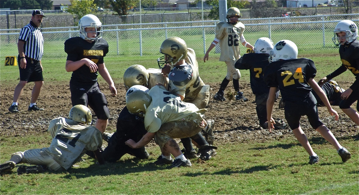 Image: Salcido rumbles — Issac Salcido tries to break away from the Hubbard defense with help from his blockers.