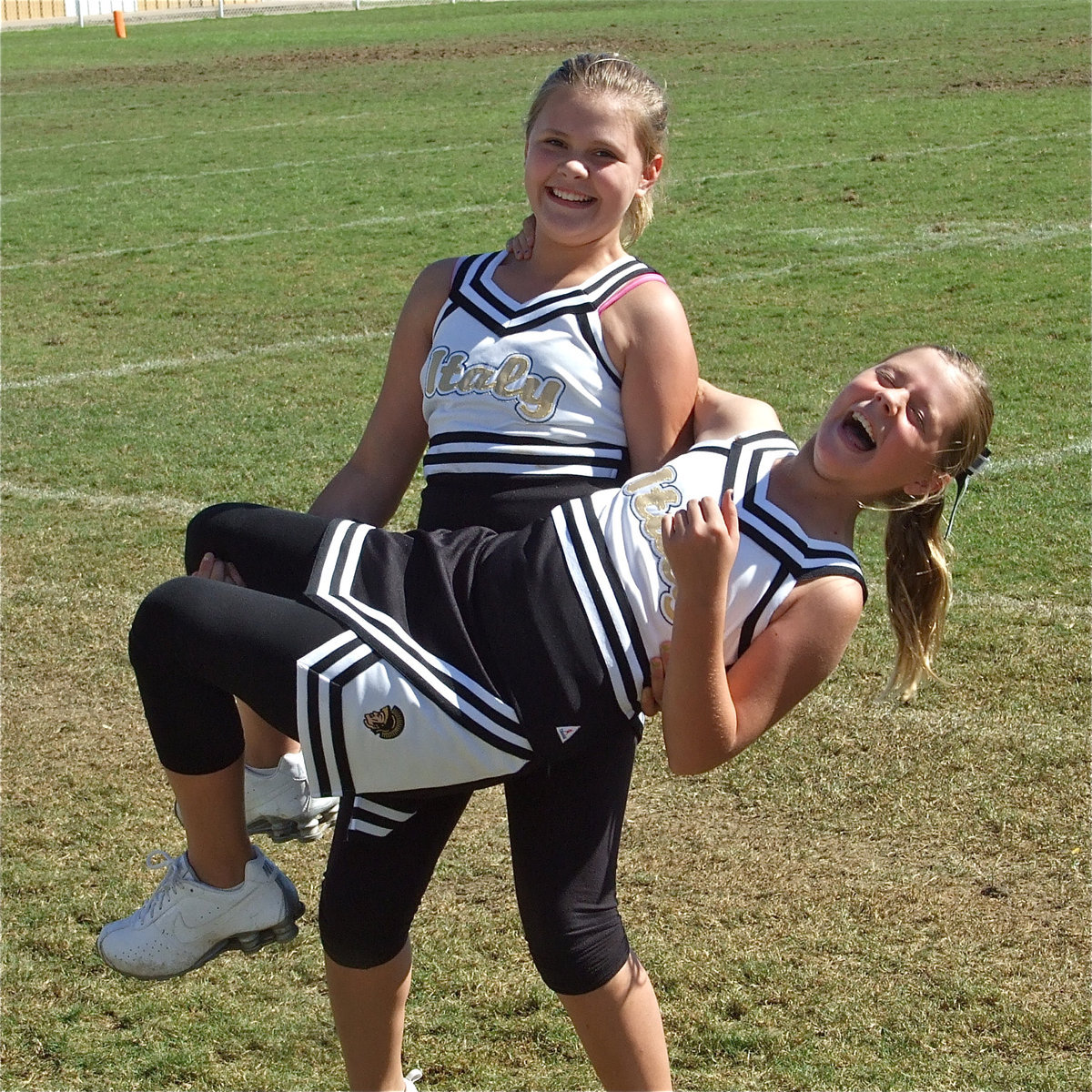 Image: Laughing it up — Lillie Perry and Brooke DeBorde keep spirits up during the games.