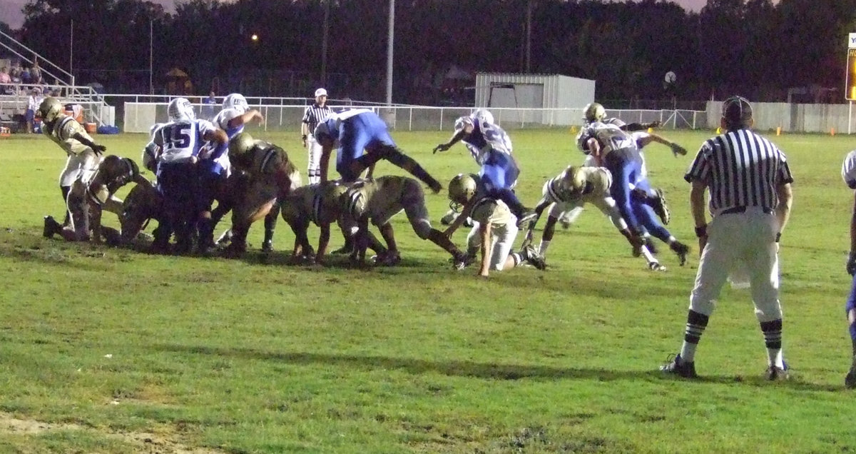 Image: Blocked up — Italy kicks a PAT against the Bears.