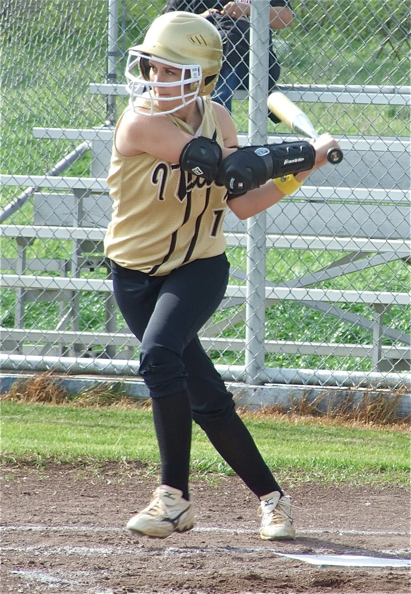 Image: Courtney connects — Courtney Westbrook(10) puts the ball into play against Frost.