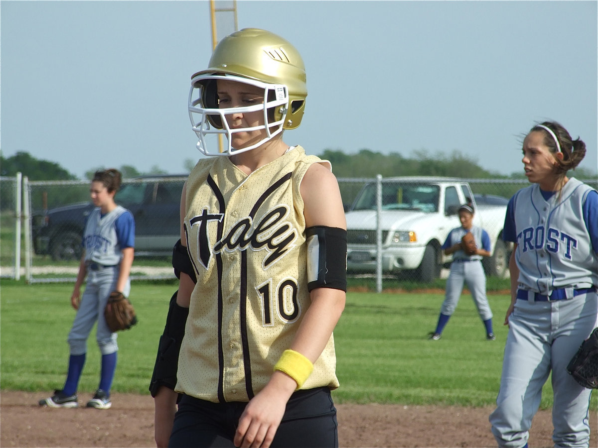 Image: Courtney is on base — Courtney Westbrook(10) returns to first base after a foul ball.